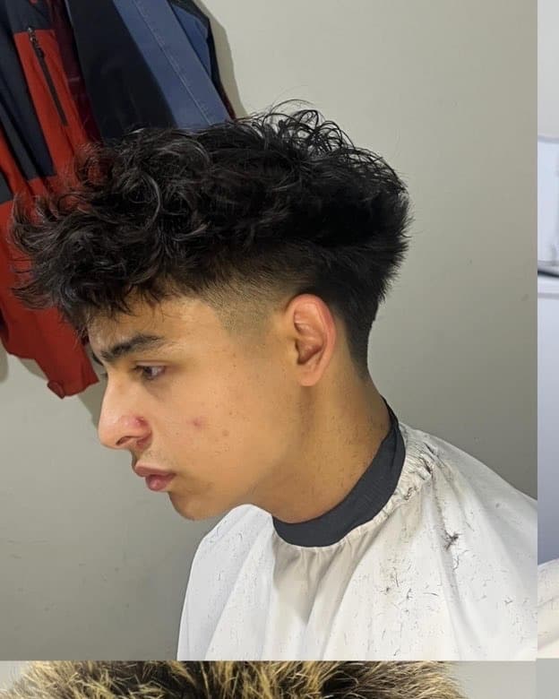 Curly-top fade, side profile